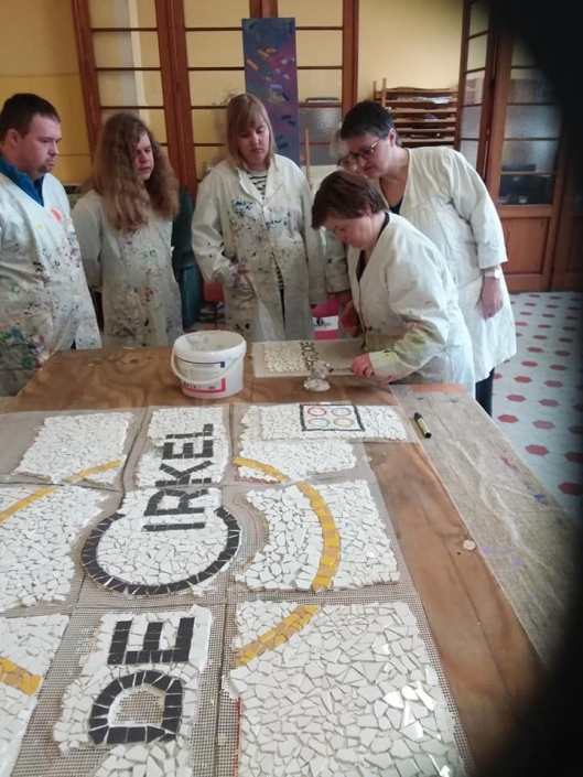 Mozaïek met mindervaliden